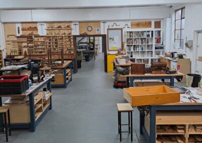 Workshop full of furniture restoration projects ready to start the day